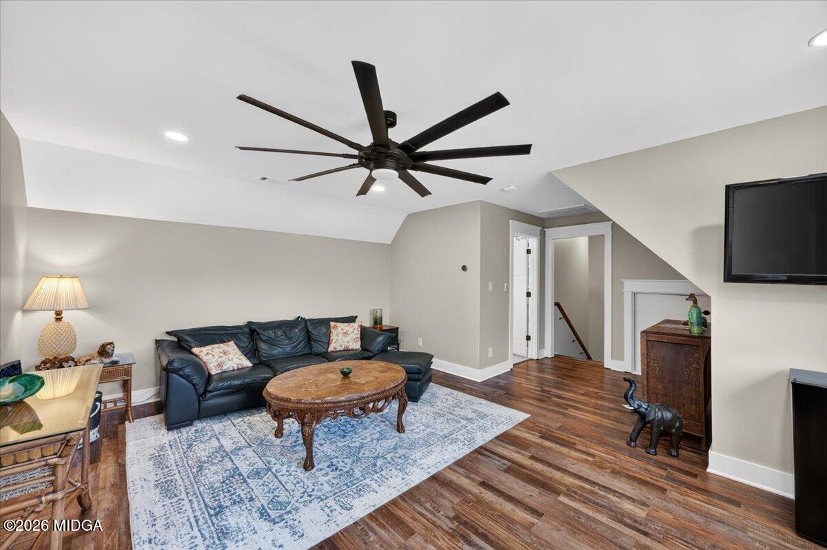 7287 Moseley Dixon Road Macon, GA 31220 - Photo 31 of 83 a living room with furniture and a rug