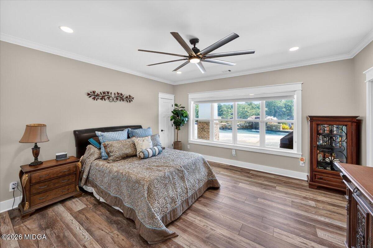 7287 Moseley Dixon Road Macon, GA 31220 - Photo 37 of 83 a bedroom with a large bed and a window