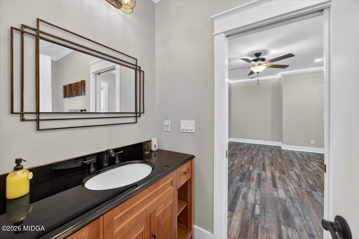 7287 Moseley Dixon Road Macon, GA 31220 - Photo 45 of 83 a bathroom with a sink and a mirror