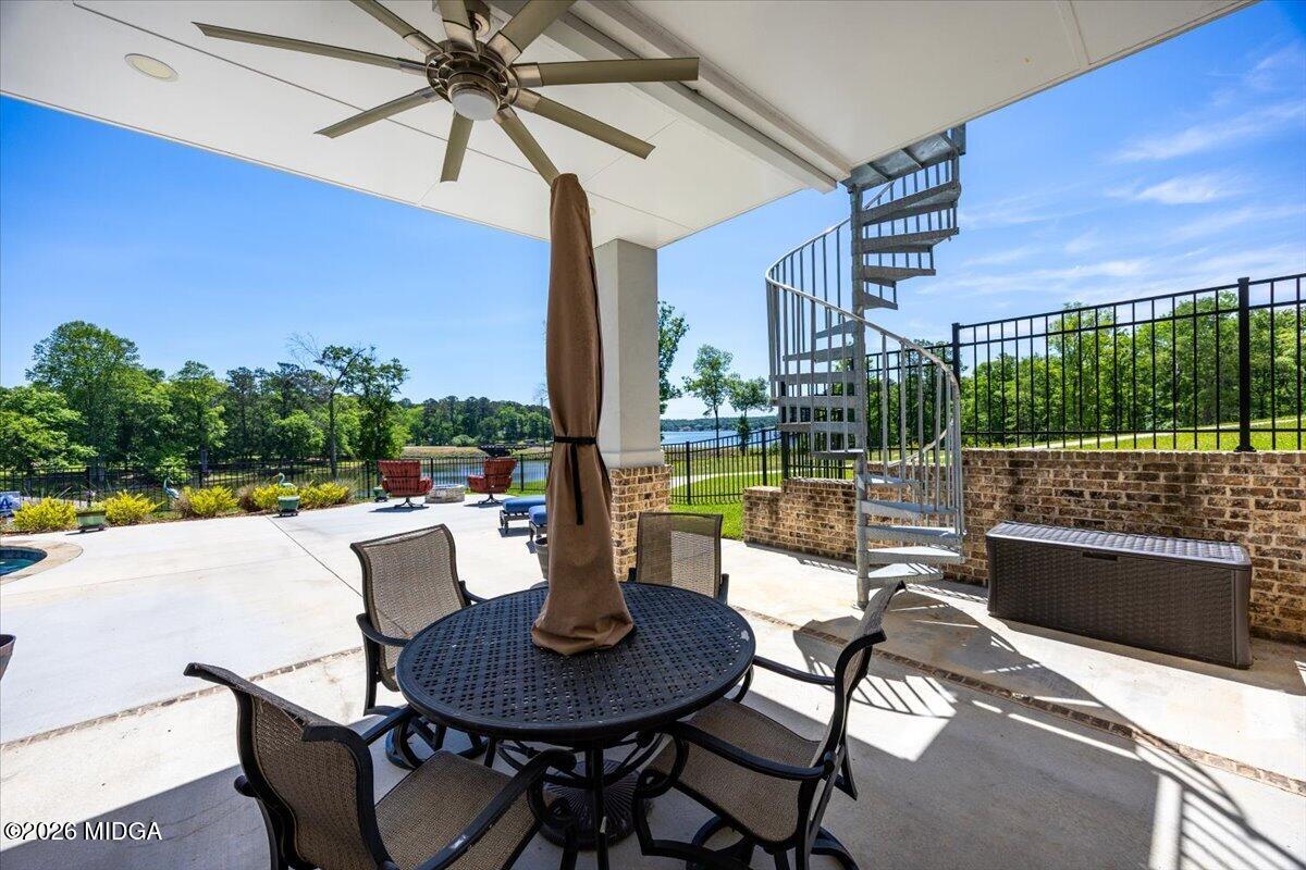 7287 Moseley Dixon Road Macon, GA 31220 - Photo 47 of 83 a view of a patio with a table chairs and a potted plant