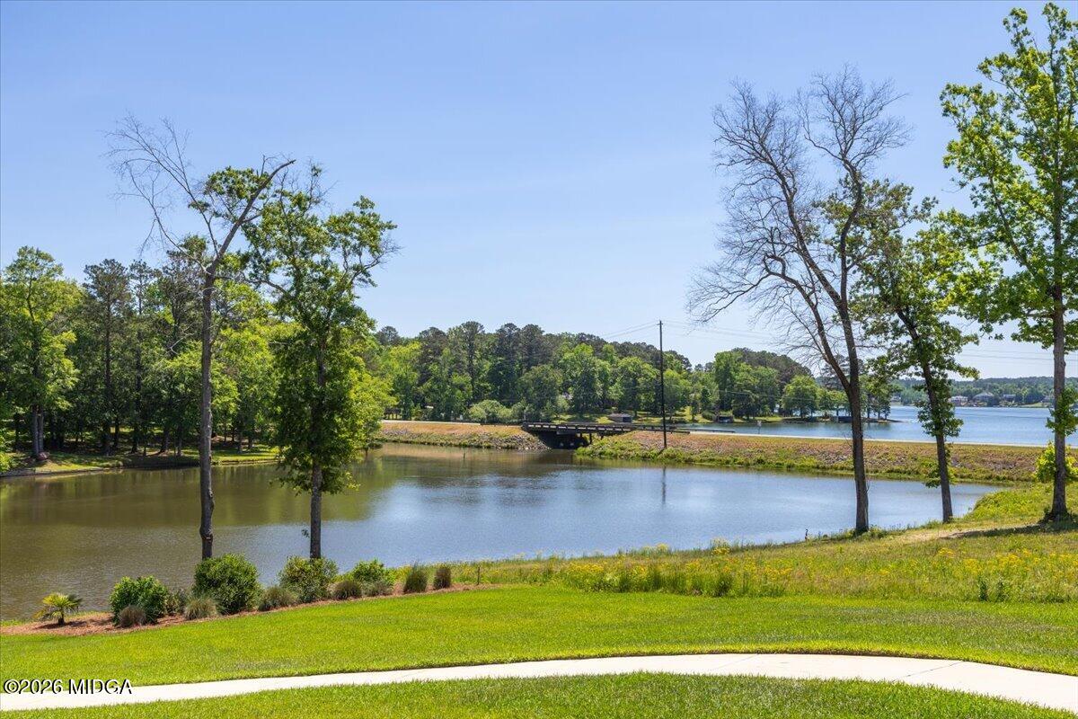 7287 Moseley Dixon Road Macon, GA 31220 - Photo 61 of 83 a view of a swimming pool with an outdoor space and seating area