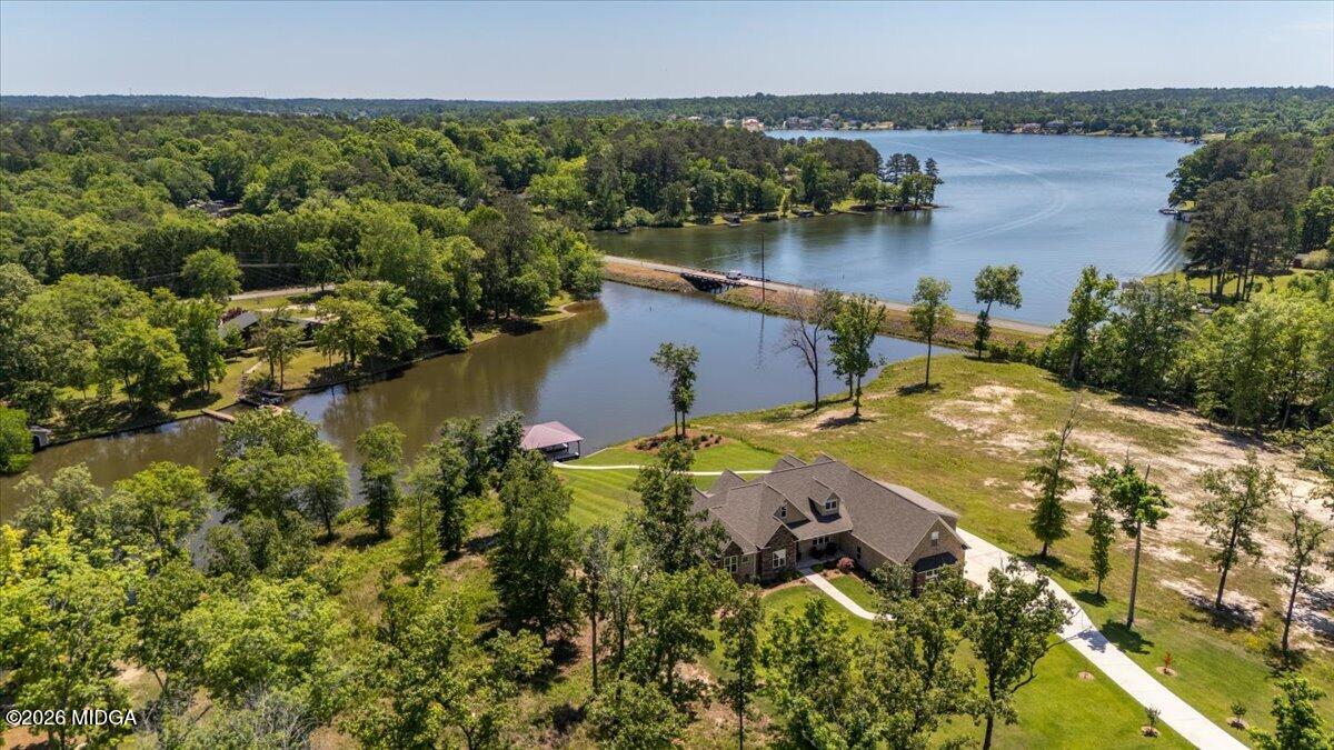 7287 Moseley Dixon Road Macon, GA 31220 - Photo 64 of 83 an aerial view of a house with a lake view