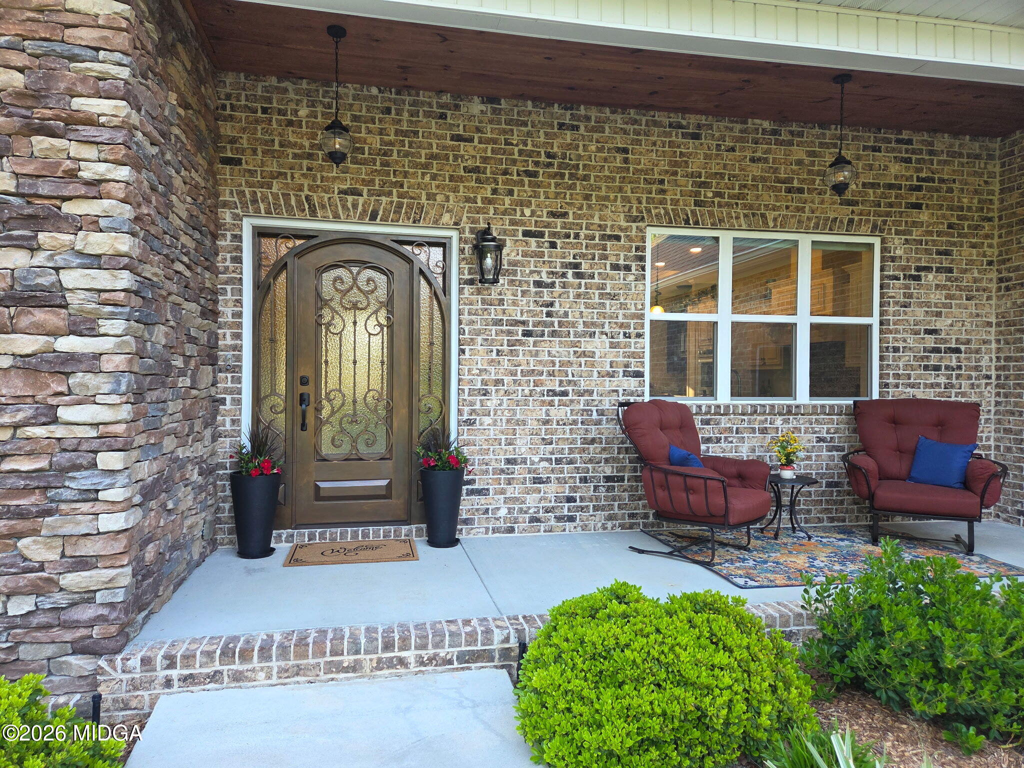 7287 Moseley Dixon Road Macon, GA 31220 - Photo 76 of 83 a front view of a house with outdoor seating