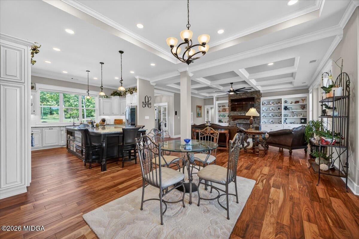 7287 Moseley Dixon Road Macon, GA 31220 - Photo 8 of 83 a view of a dining room with furniture window and wooden floor