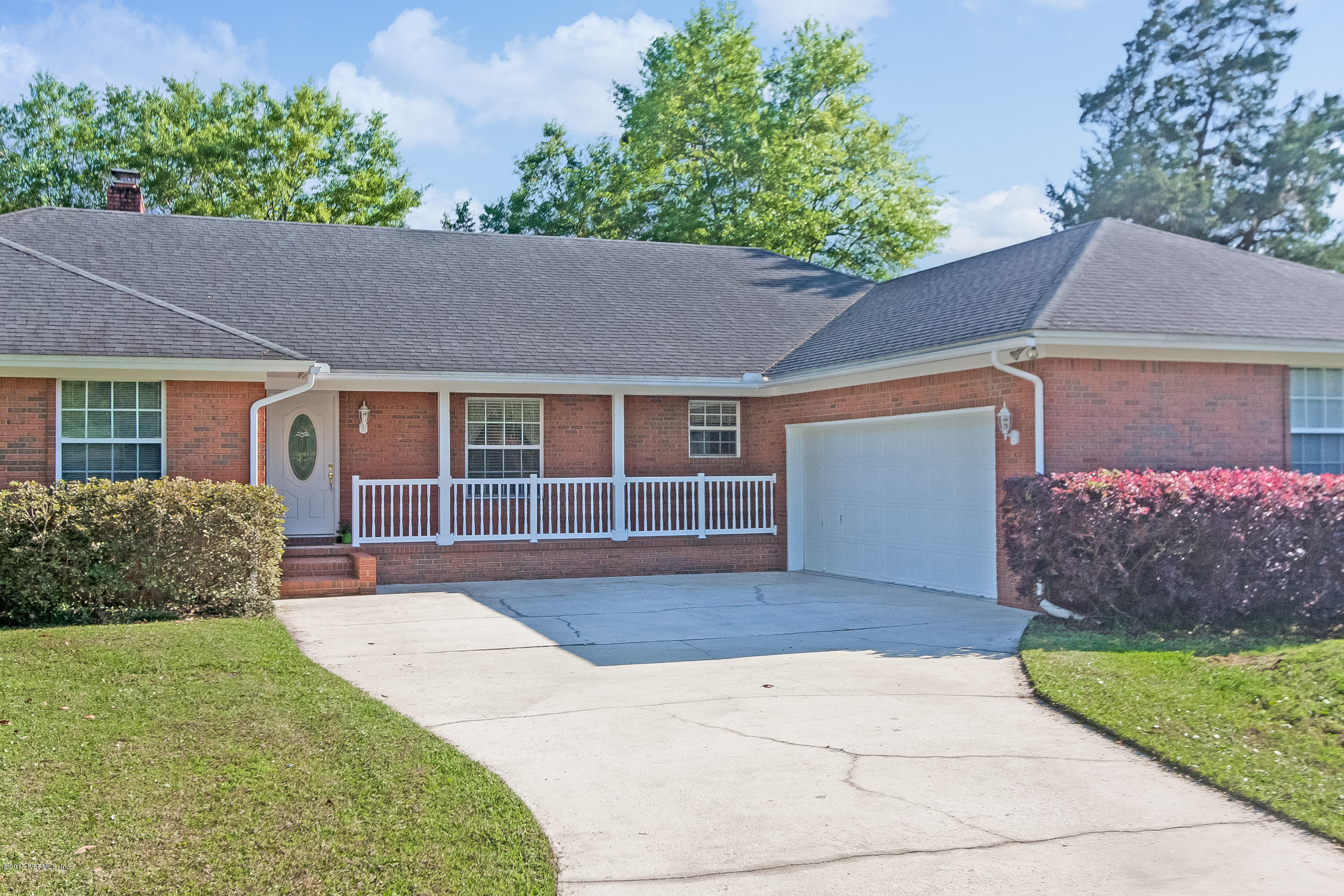 75109 Edwards Road Yulee, FL 32097 - Photo 1 of 30 front view of a house with a yard