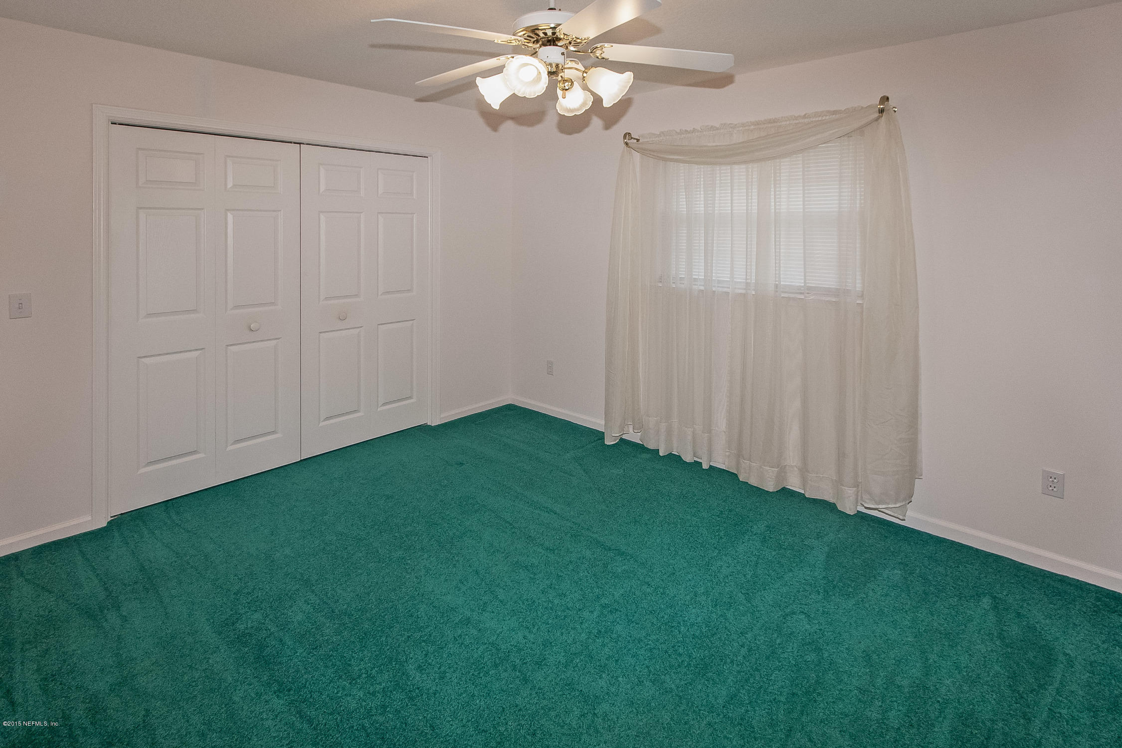 75109 Edwards Road Yulee, FL 32097 - Photo 14 of 30 a view of a fan room with a fan