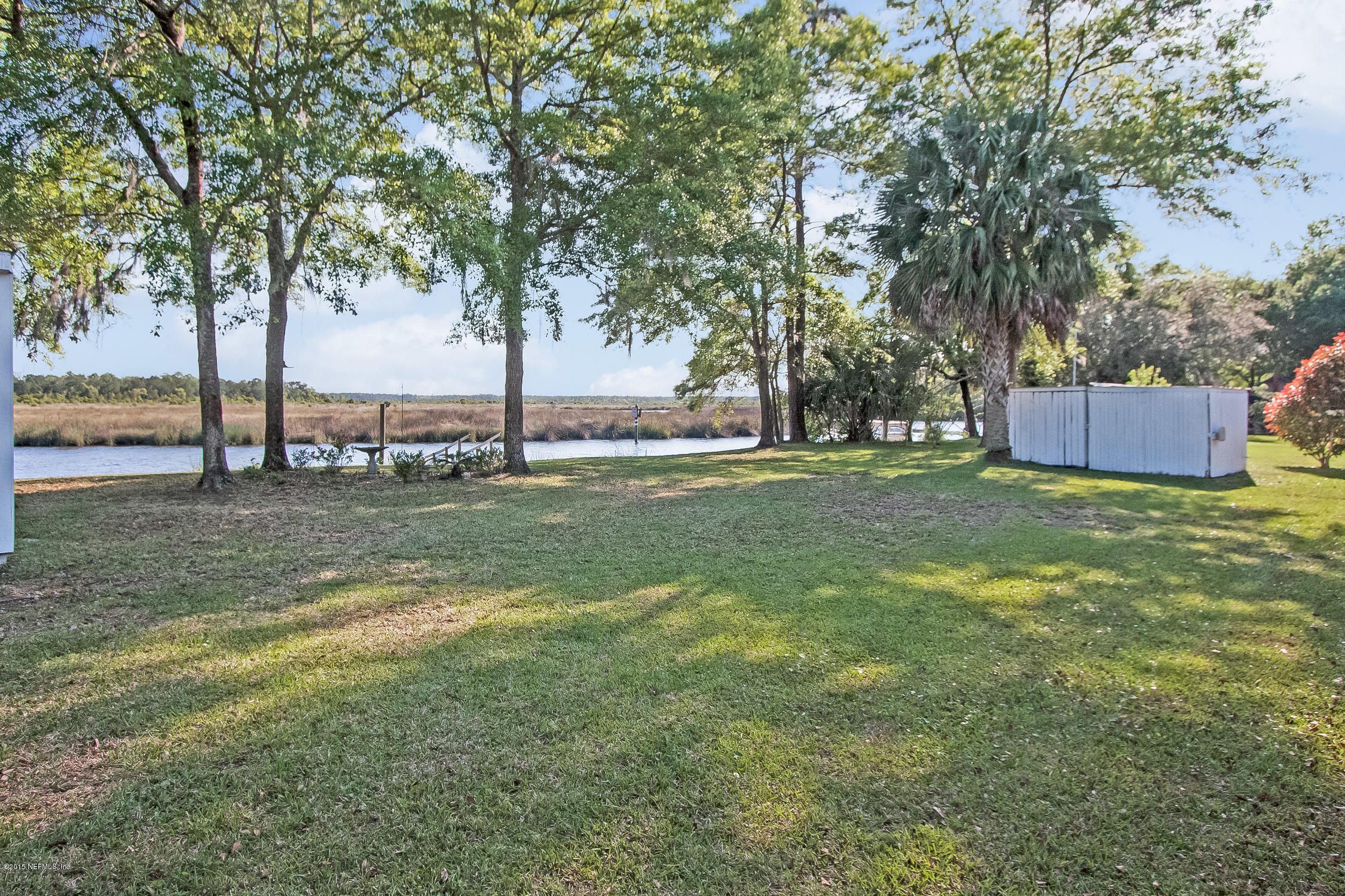 75109 Edwards Road Yulee, FL 32097 - Photo 23 of 30 a view of a field with trees