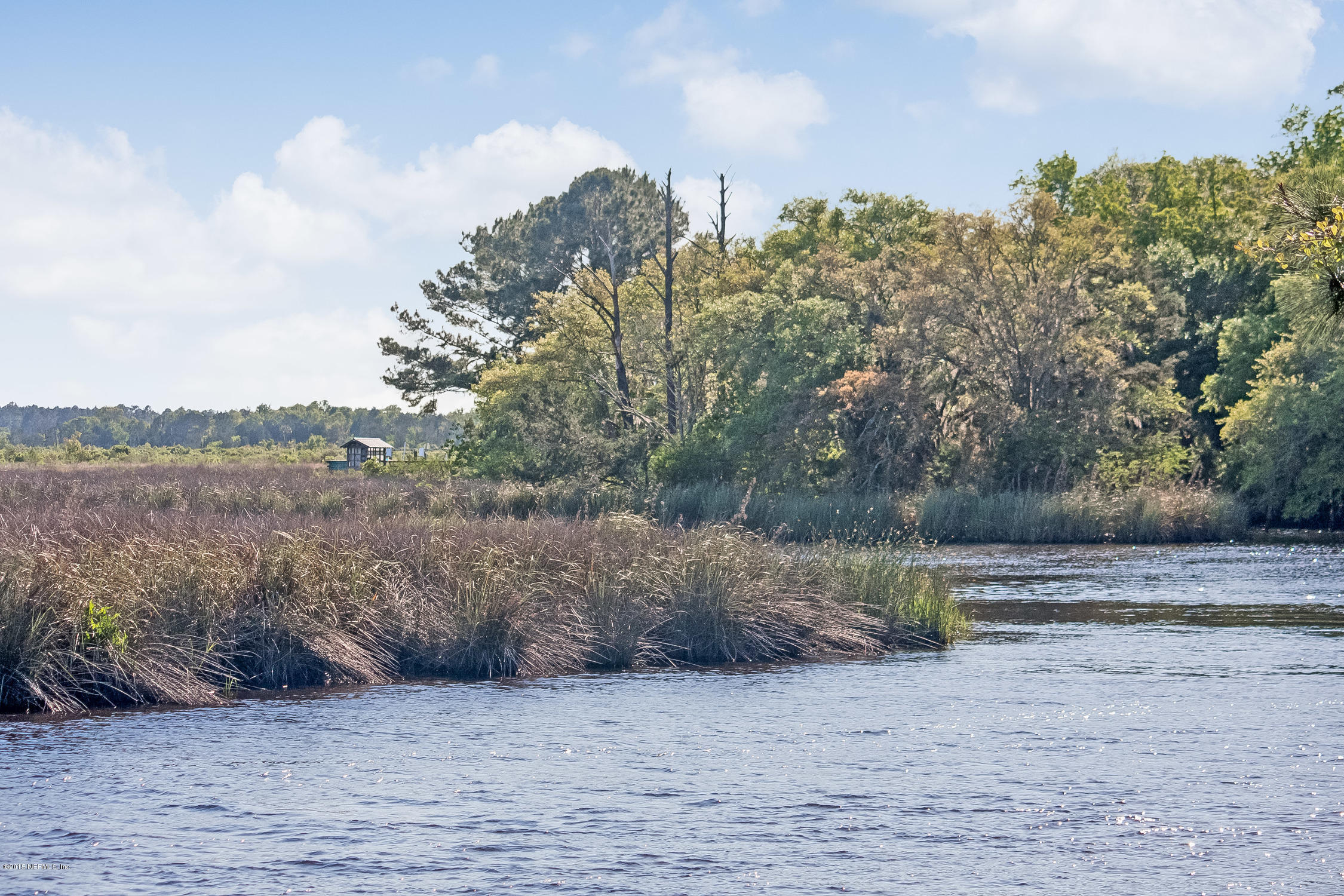 75109 Edwards Road Yulee, FL 32097 - Photo 27 of 30 a view of a dry yard with wooden fence