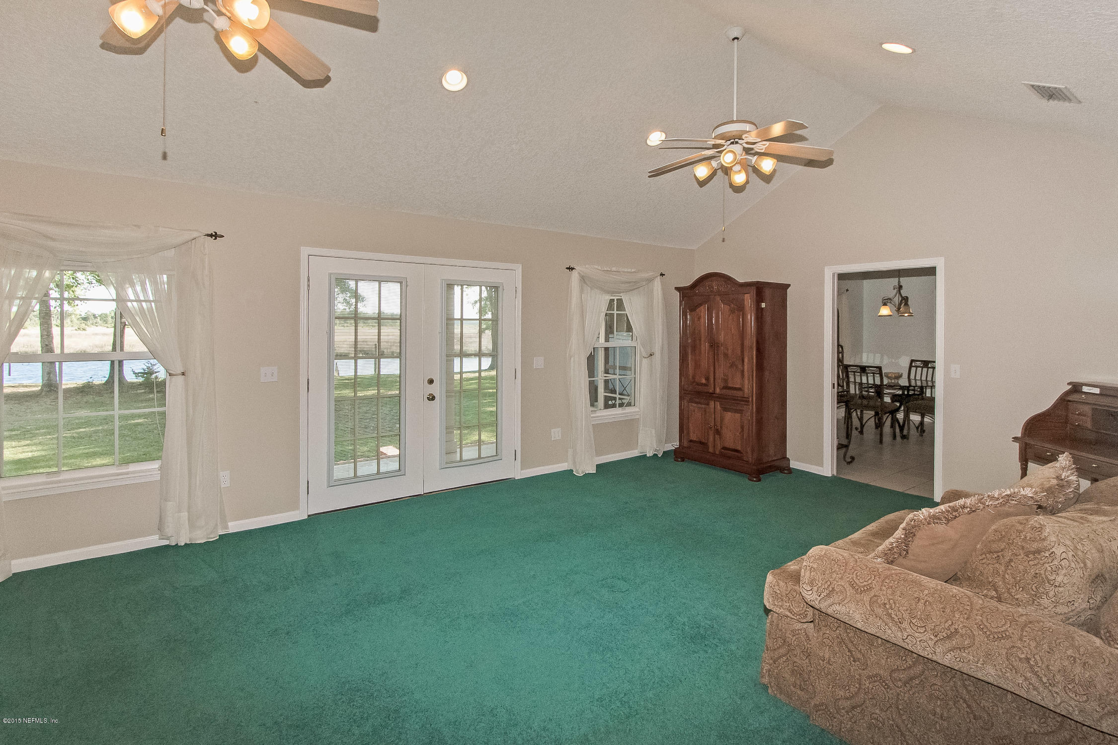 75109 Edwards Road Yulee, FL 32097 - Photo 10 of 30 a living room with furniture and a large window