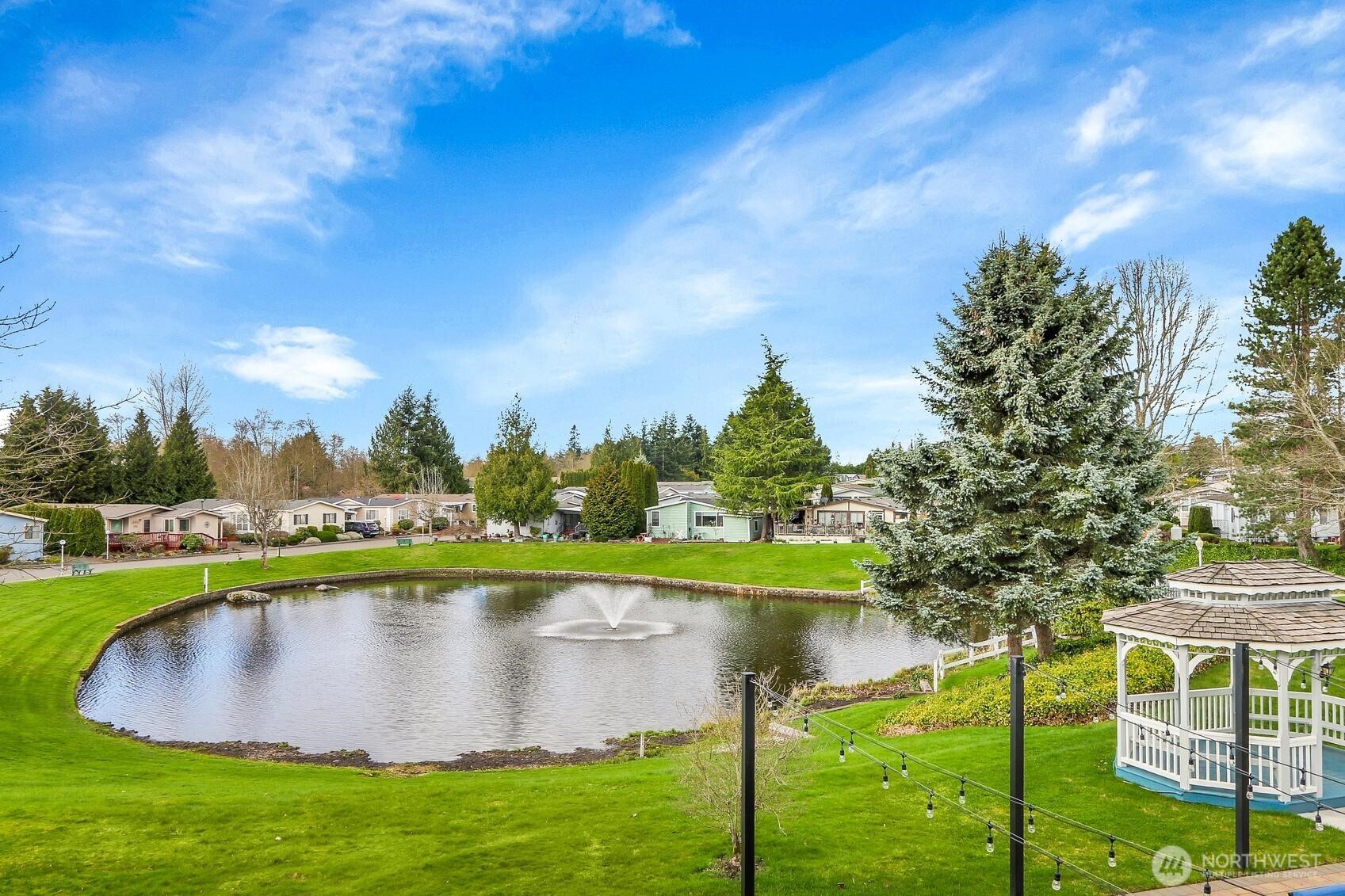 1427 100th Street Southwest, Unit 160 Everett, WA 98204 - Photo 25 of 28 a view of a lake with a city