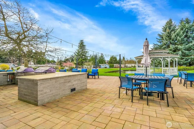 a view of chairs and tables in the patio