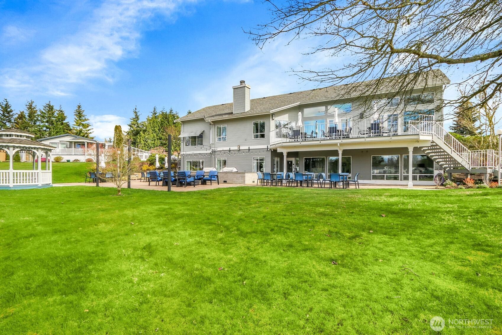 1427 100th Street Southwest, Unit 160 Everett, WA 98204 - Photo 28 of 28 a view of an house with backyard porch and sitting area
