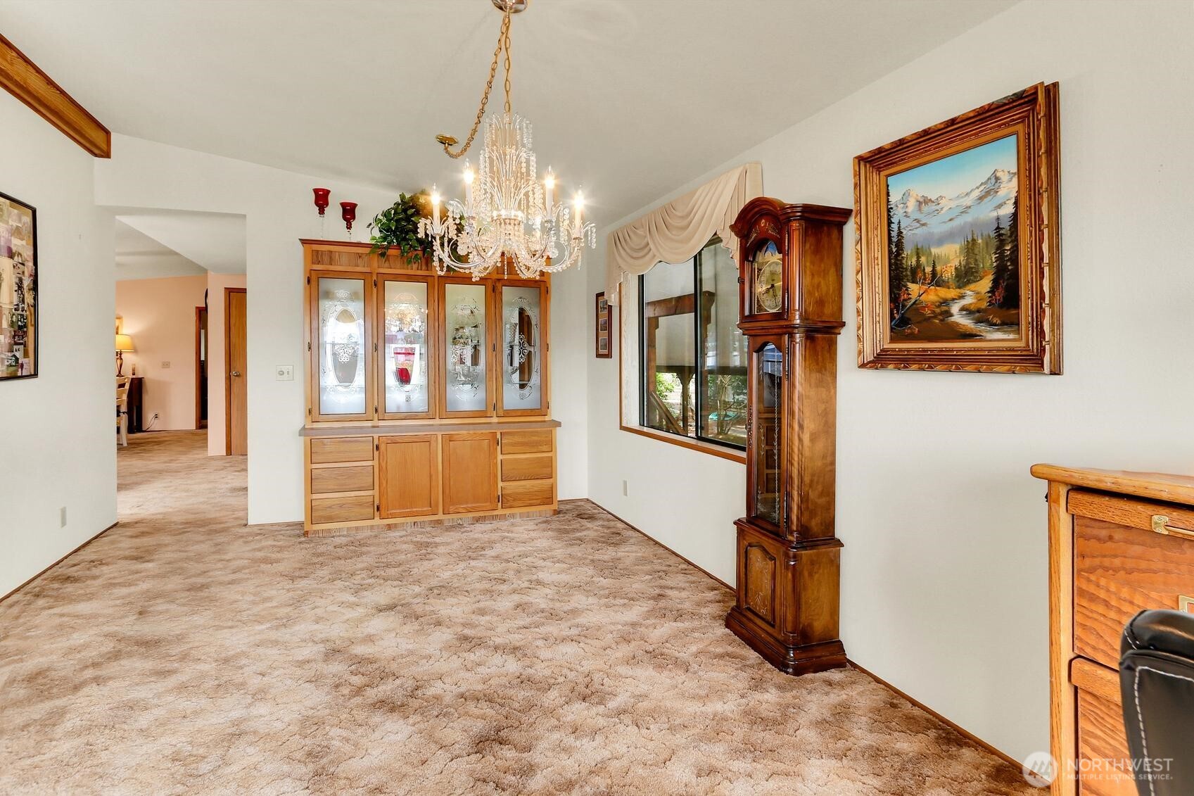 1427 100th Street Southwest, Unit 160 Everett, WA 98204 - Photo 4 of 28 a view of a hallway with a chandelier