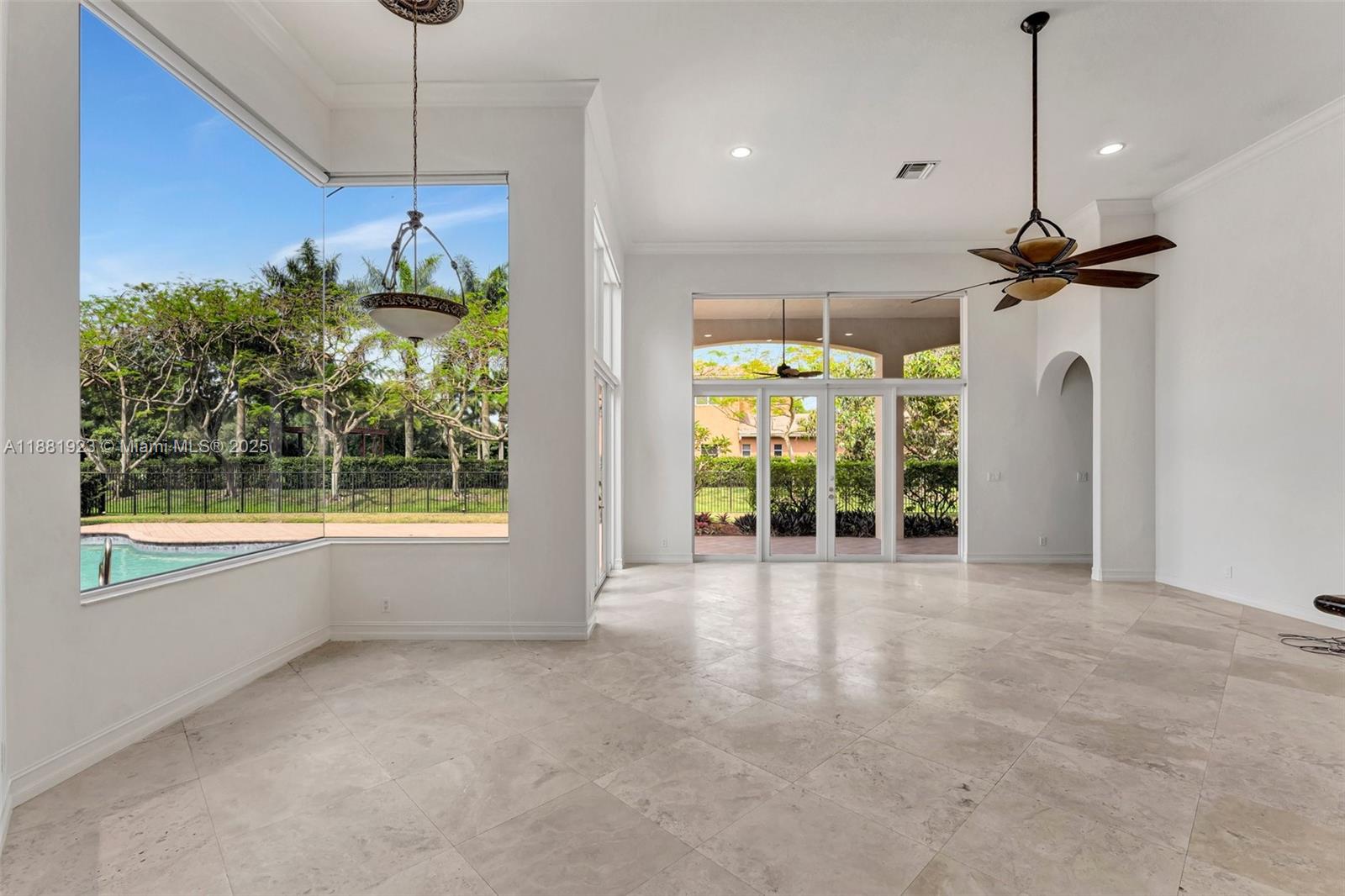 3203 West Stonebrook Circle Davie, FL 33330 - Photo 17 of 51 a view of an empty room with a window