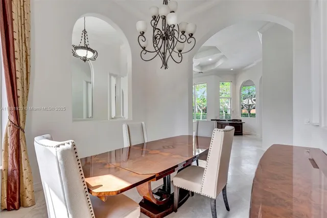 a bed room with furniture and a flat screen tv