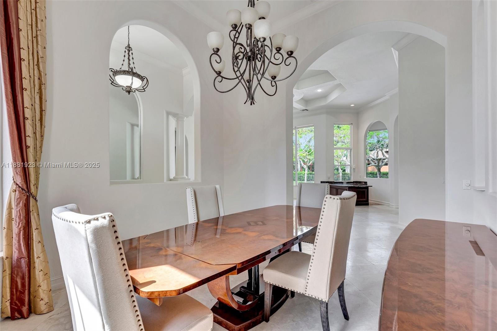 3203 West Stonebrook Circle Davie, FL 33330 - Photo 18 of 51 a view of a dining room with furniture