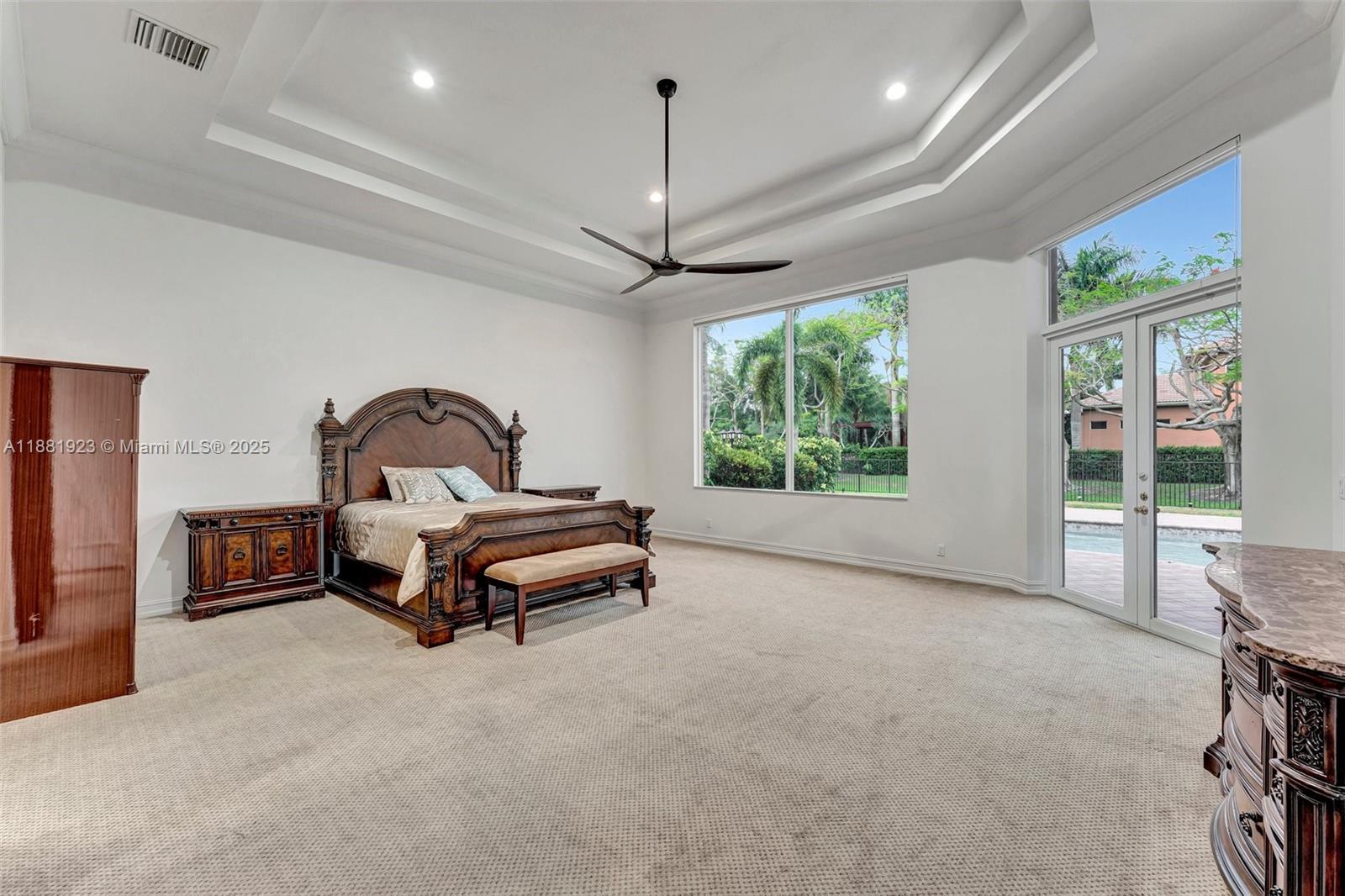 3203 West Stonebrook Circle Davie, FL 33330 - Photo 20 of 51 a bed room with furniture and a flat screen tv