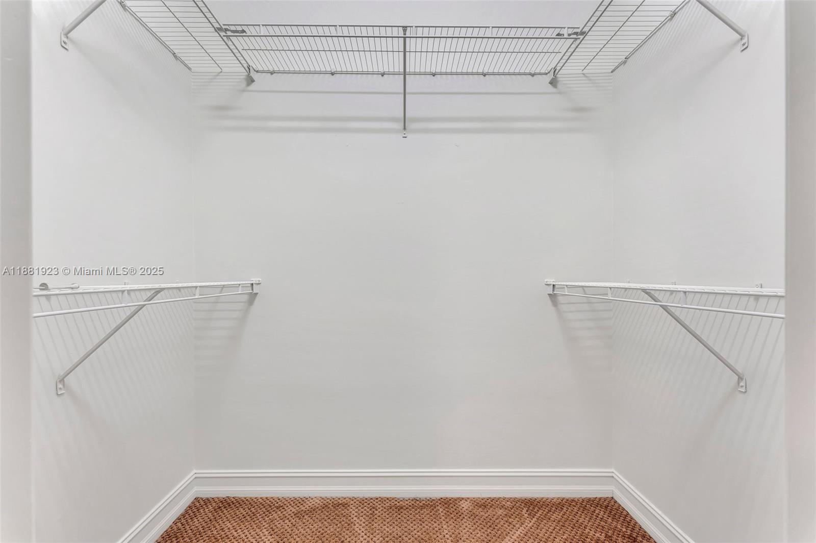 3203 West Stonebrook Circle Davie, FL 33330 - Photo 40 of 51 a view of a room with racks on the wall