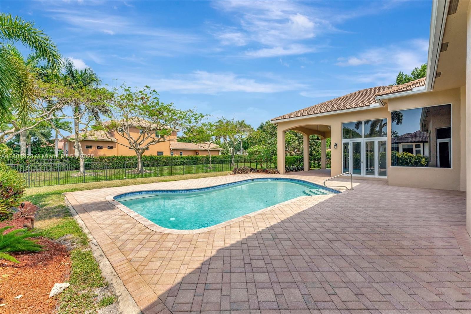 3203 West Stonebrook Circle Davie, FL 33330 - Photo 46 of 51 a view of outdoor space yard swimming pool and patio
