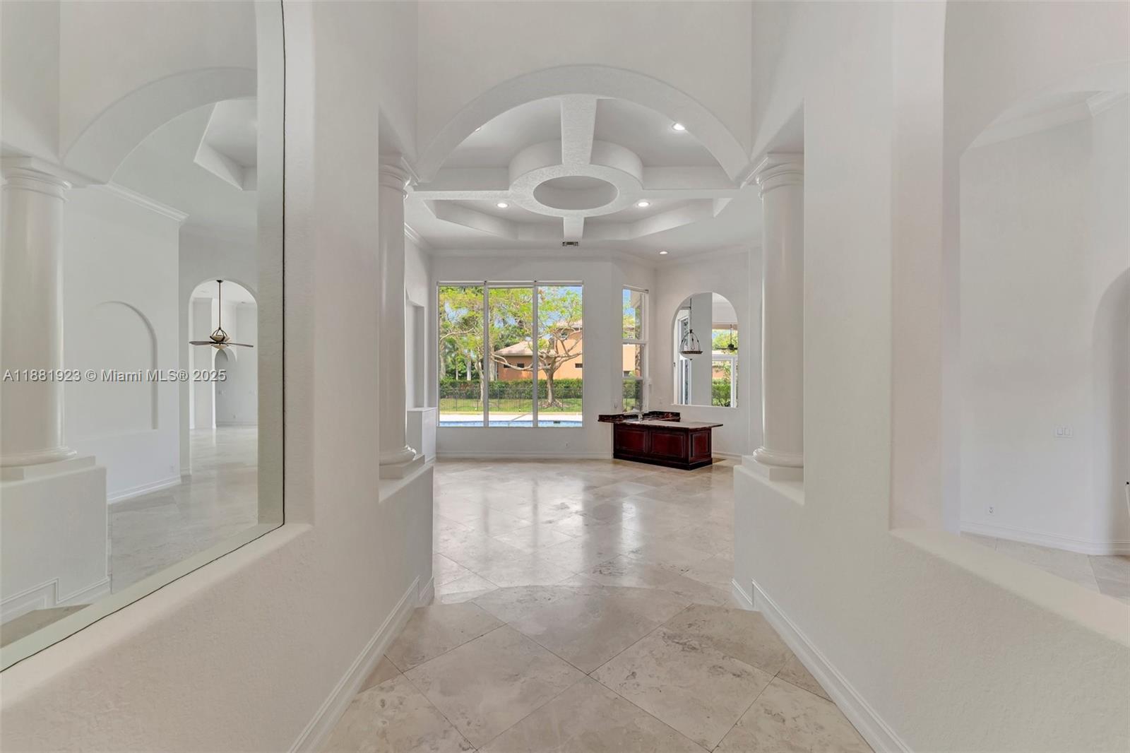 3203 West Stonebrook Circle Davie, FL 33330 - Photo 5 of 51 wooden floor in an empty room with a window