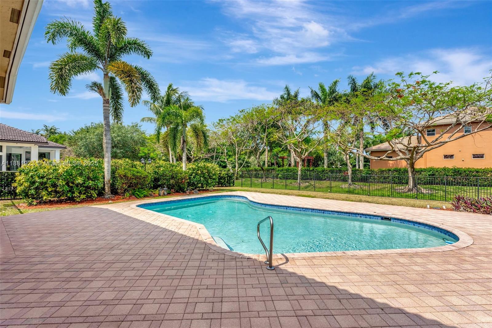 3203 West Stonebrook Circle Davie, FL 33330 - Photo 51 of 51 a view of pool with a yard