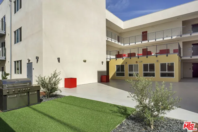 a house view with a outdoor space