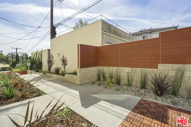 a view of balcony with a potted plant