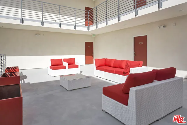 a living room with furniture and a couch