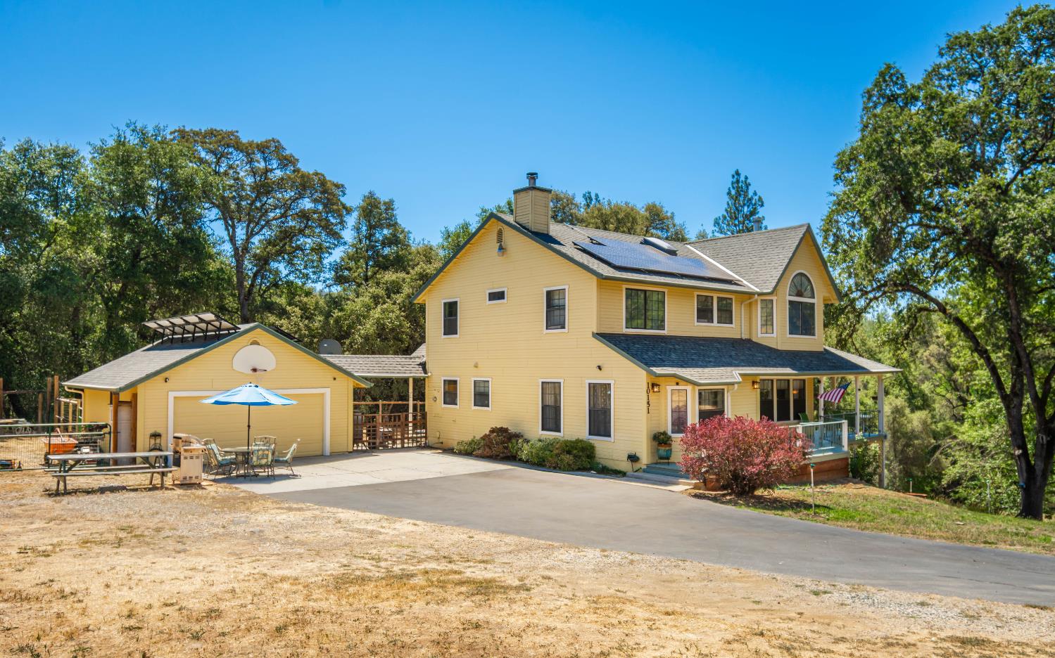 10151 Trauner Road Rough and Ready, CA 95975 - Photo 39 of 45 a view of a house with a yard