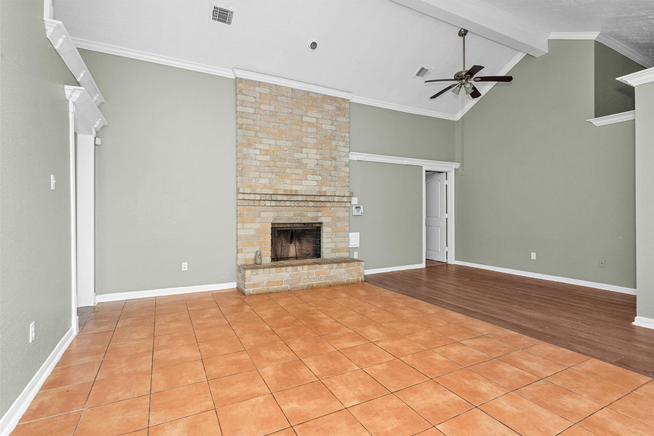 12443 South Rachlin Circle Houston, TX 77071 - Photo 6 of 29 a view of an empty room with a fireplace