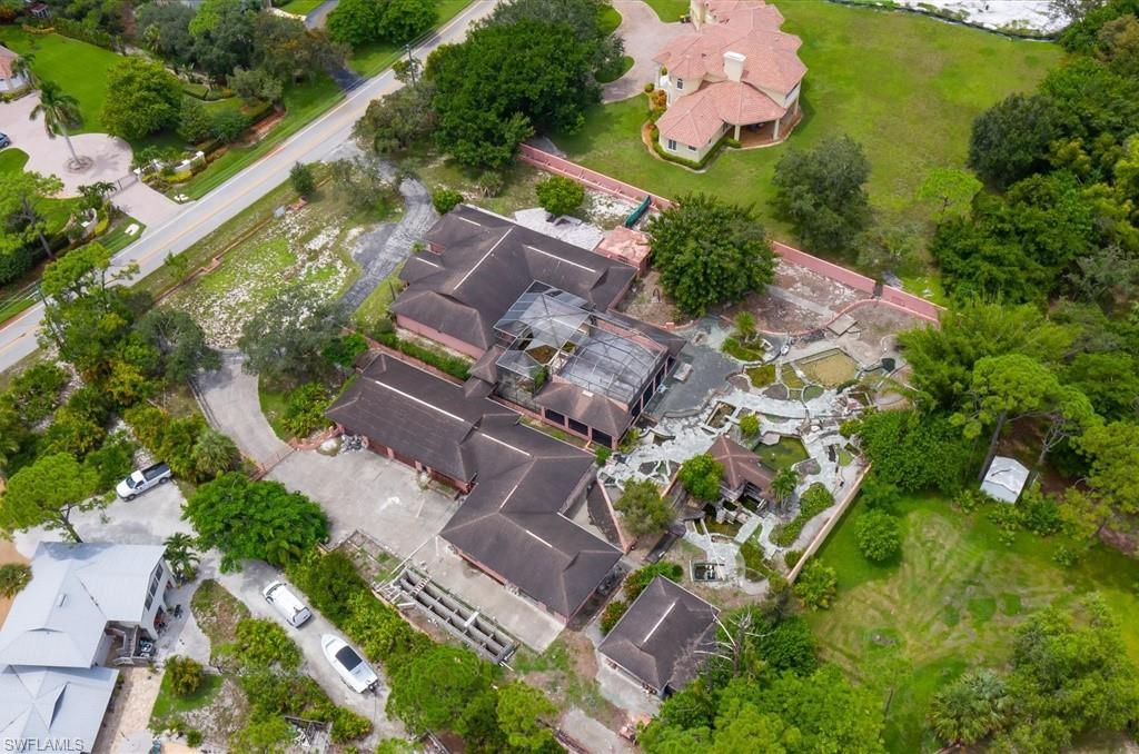 528 Ridge Drive Naples, FL 34108 - Photo 5 of 6 an aerial view of house with yard