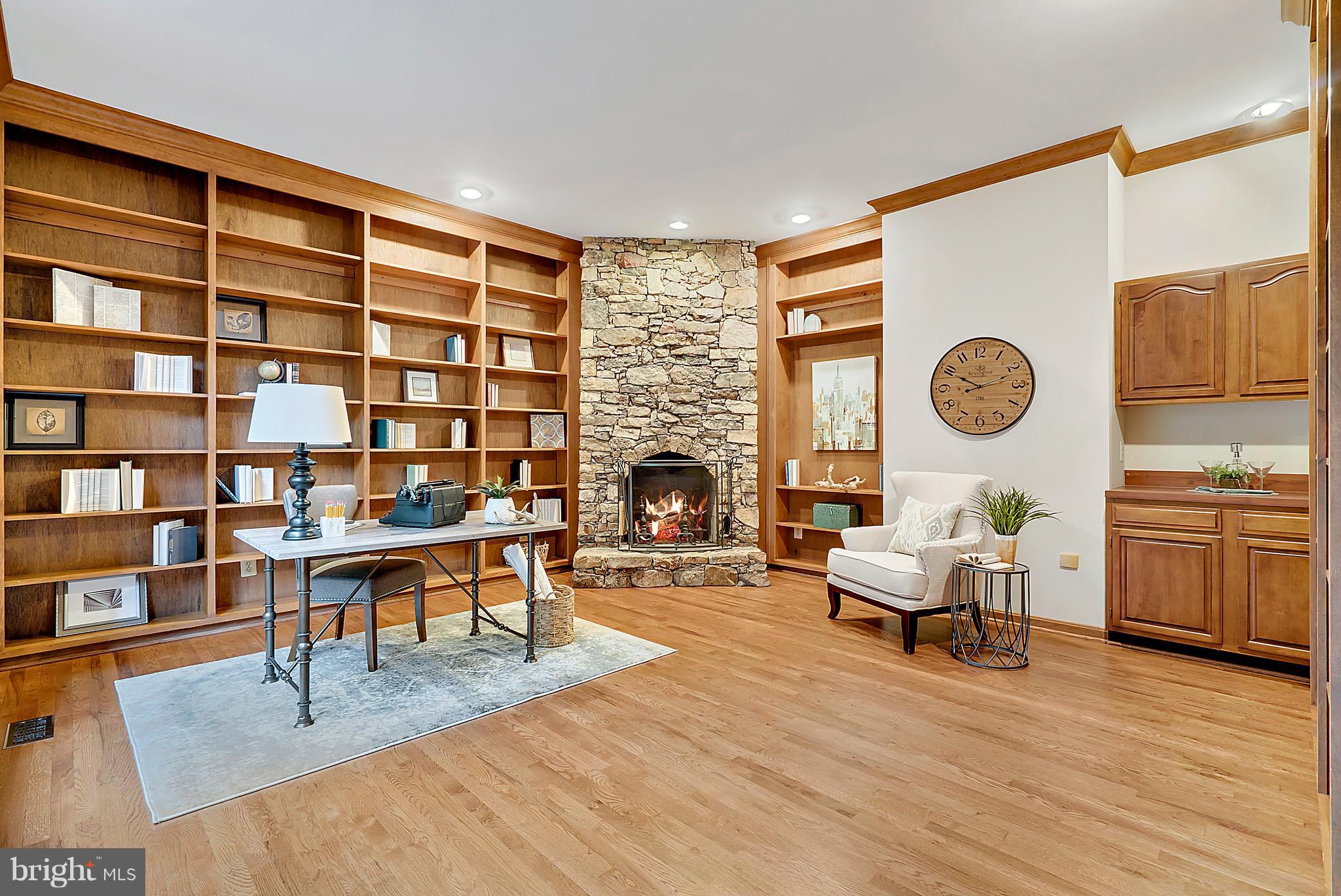 Private study with stone fireplace