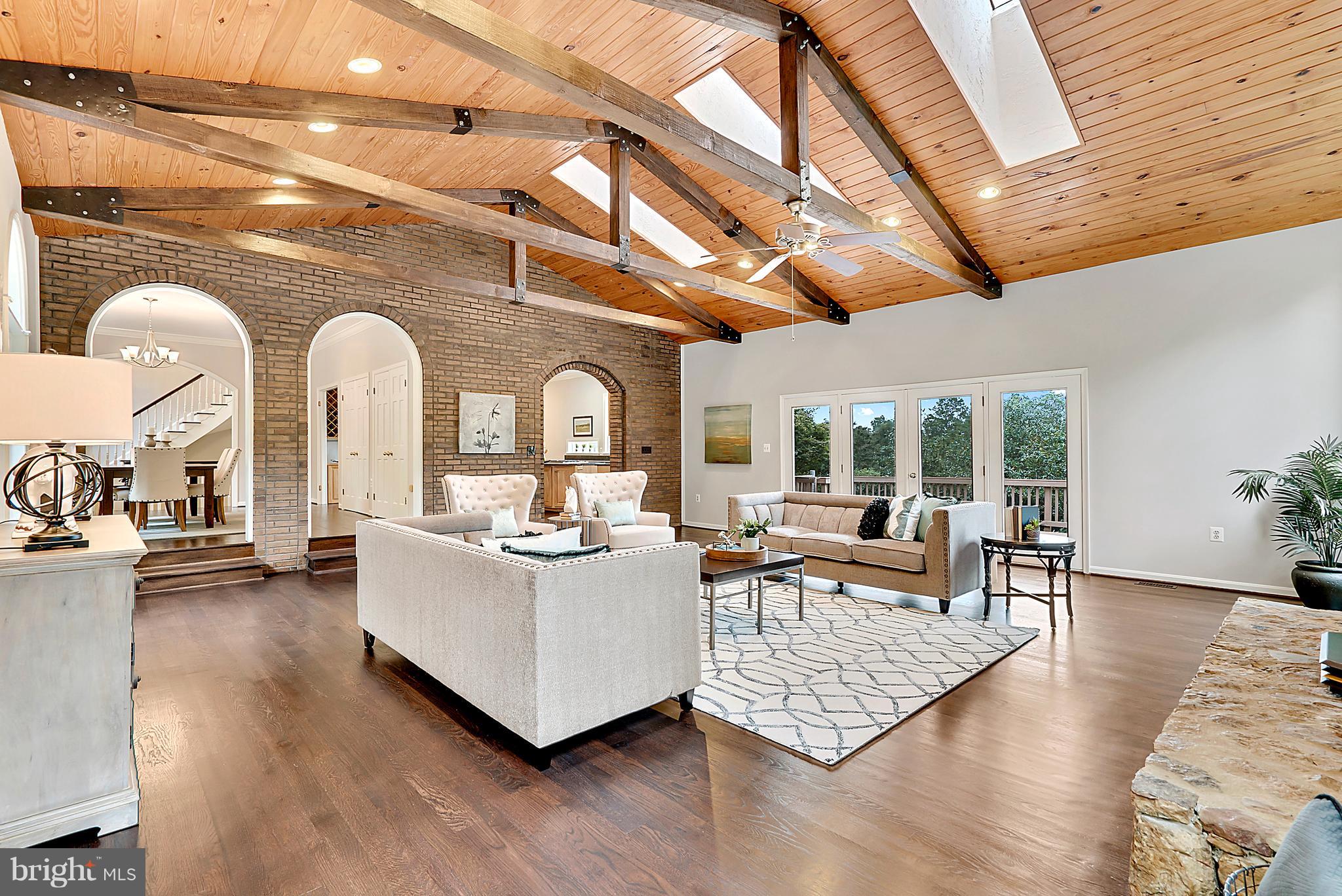 4354 High Ridge Road Haymarket, VA 20169 - Photo 10 of 30 Spacious Family Room with brick wall