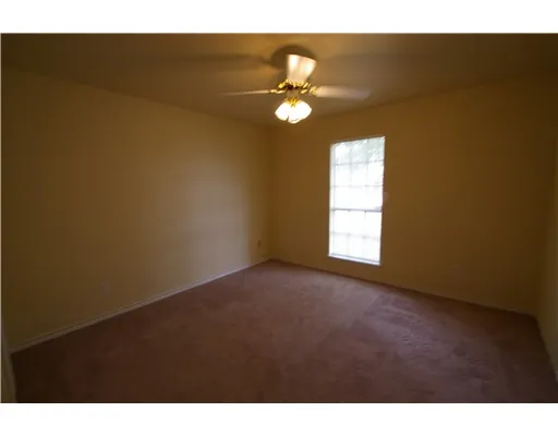 a view of a big room with wooden floor