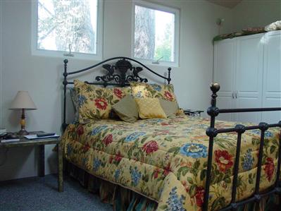 8380 Germone Road Sebastopol, CA 95472 - Photo 11 of 11 a bedroom with a bed and window