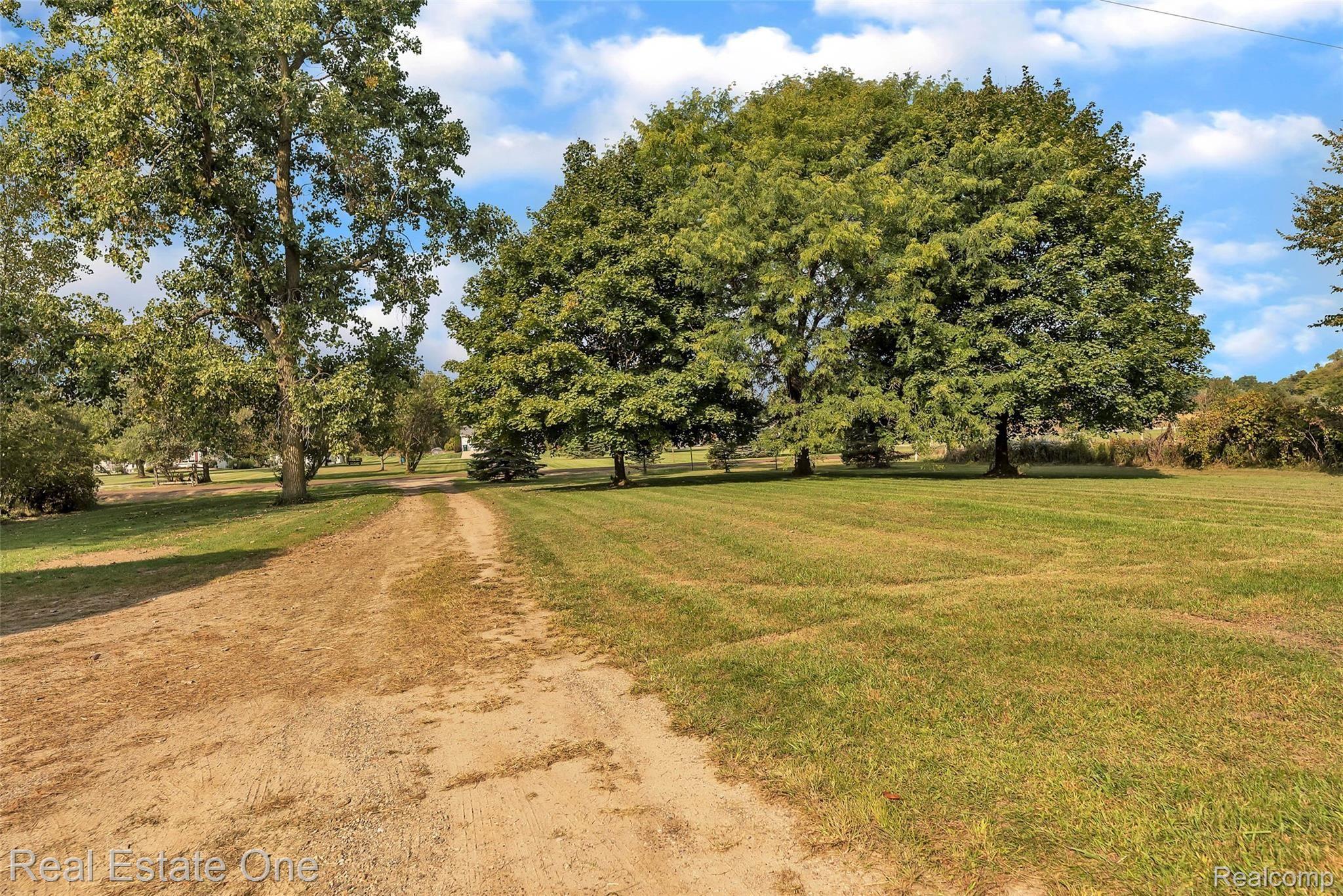 5400 North Fleming Road Fowlerville, MI 48836 - Photo 37 of 40 42-5400 Fleming Rd-WindowStill-Real.jpg
