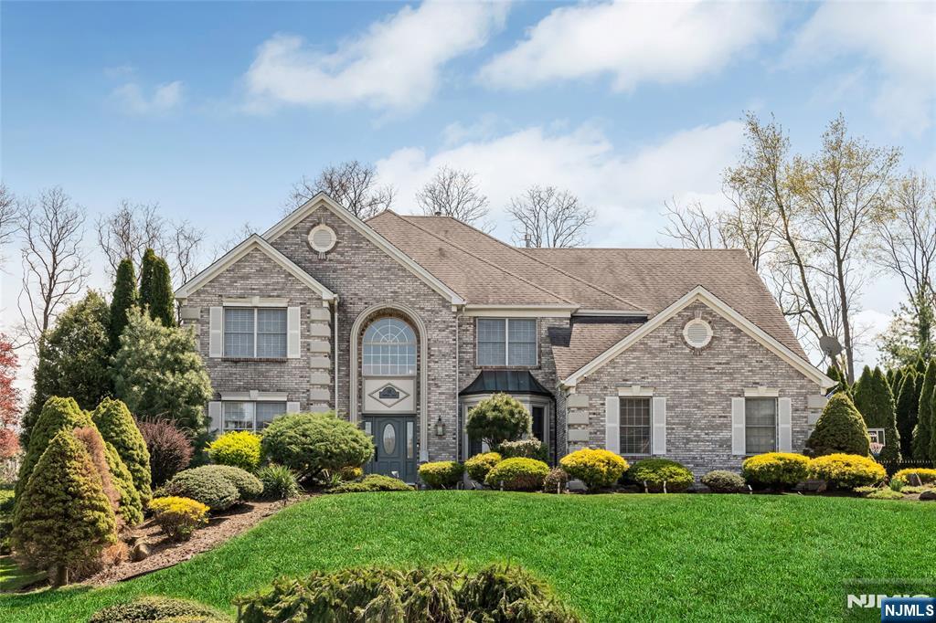 18 Renshaw Drive Montville, NJ 07045 - Photo 1 of 46 a front view of a house with garden