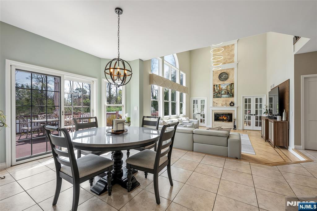 18 Renshaw Drive Montville, NJ 07045 - Photo 11 of 46 a view of a dining room with furniture window and outside view
