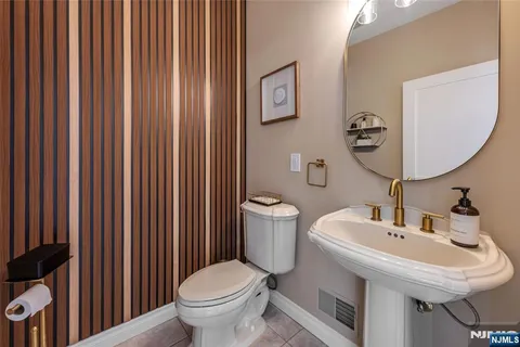 a bathroom with a toilet and a sink