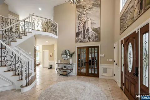 a view of an entryway with a hallway