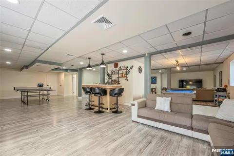 a living room with furniture and a table