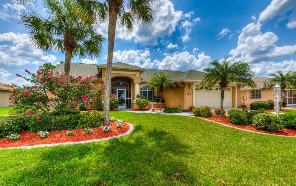 Welcome to this one of a kind custom built home with public WATER AND SEWER in coveted Gulf View Estates!