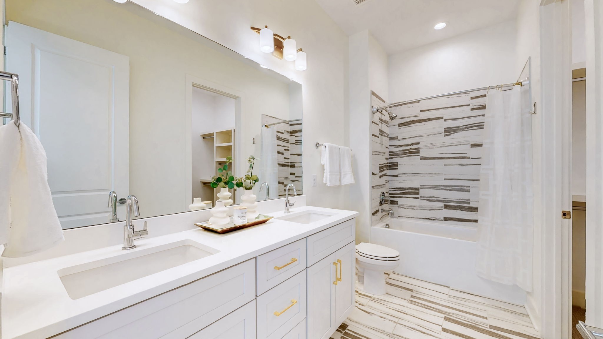 409 Herringbone Court Franklin, TN 37064 - Photo 15 of 36 a bathroom with a double vanity sink toilet and shower