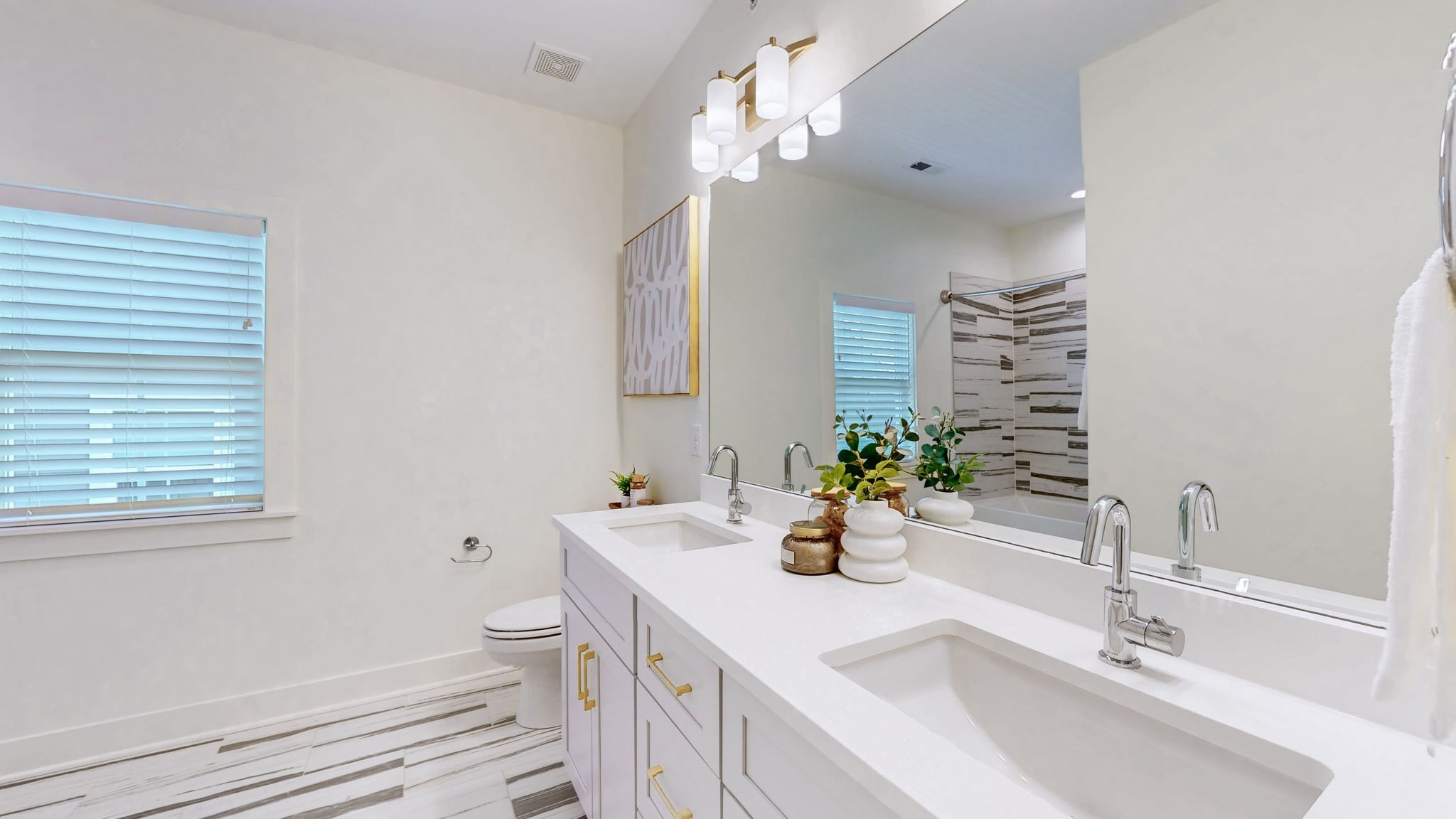 409 Herringbone Court Franklin, TN 37064 - Photo 22 of 36 a bathroom with a double vanity sink mirror and toilet