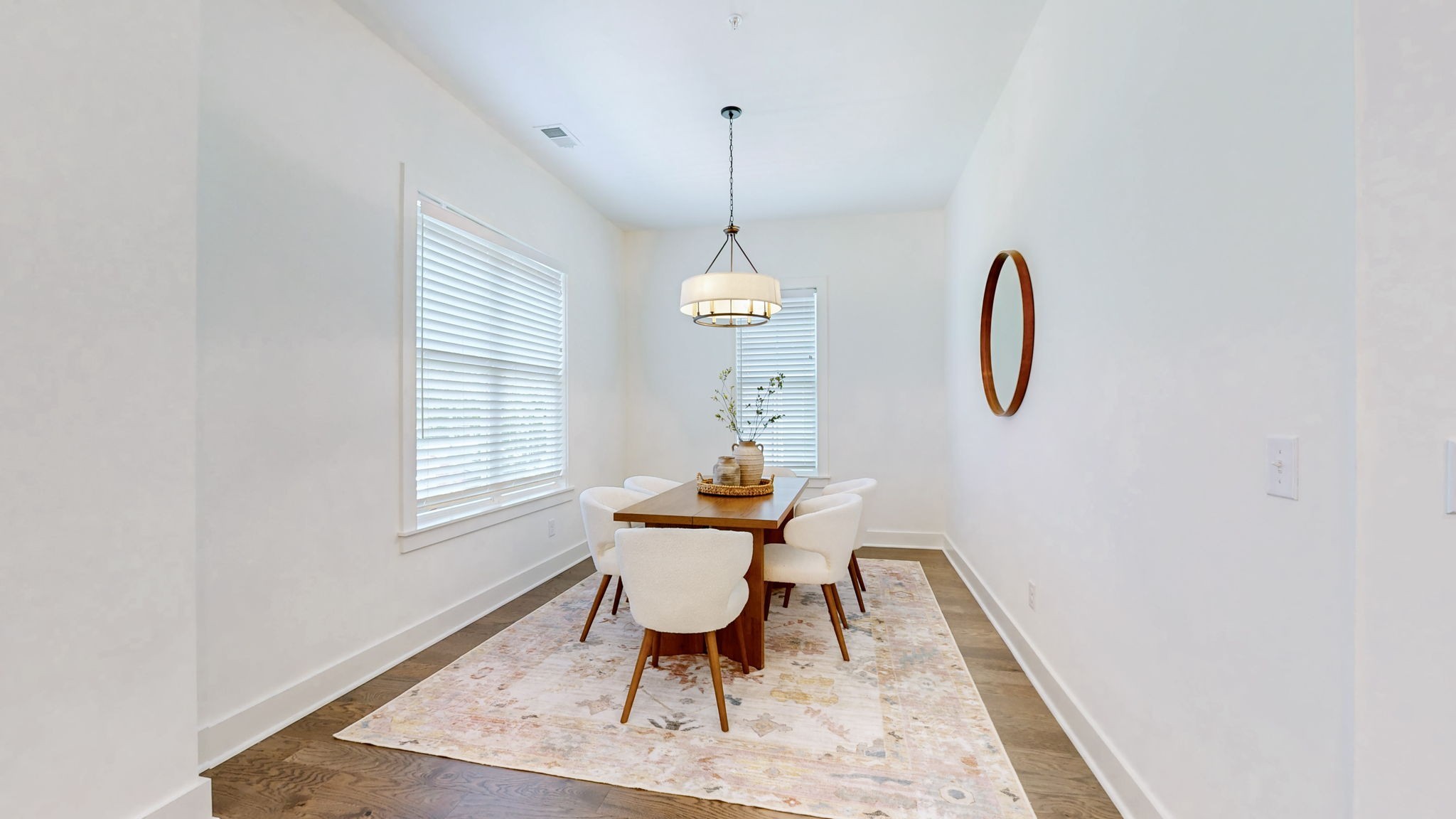 409 Herringbone Court Franklin, TN 37064 - Photo 9 of 36 a dining room with furniture a chandelier and wooden floor