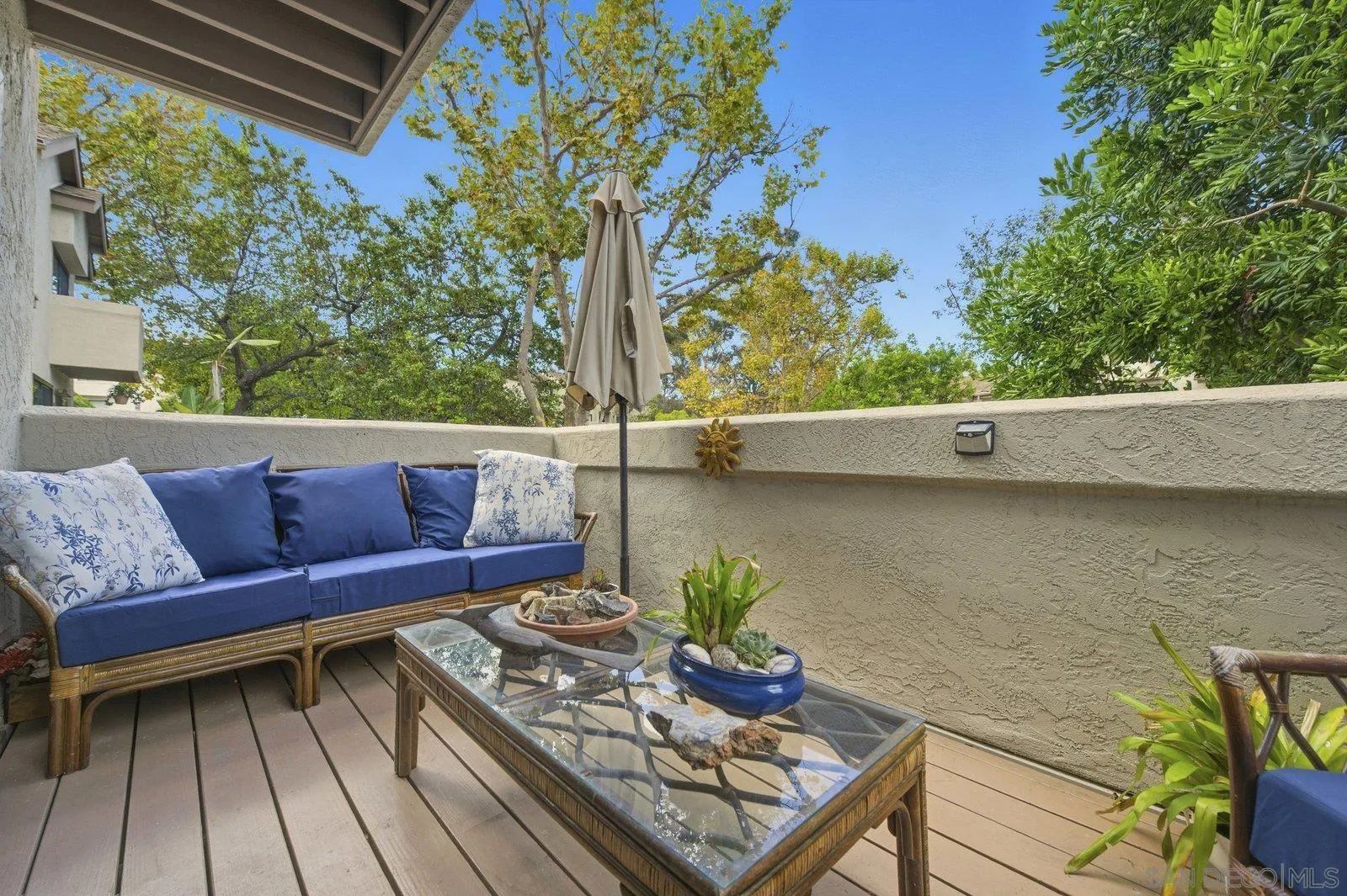 2742 Ariane Drive, Unit 153 San Diego, CA 92117 - Photo 18 of 43 a outdoor living room with furniture and a potted plant
