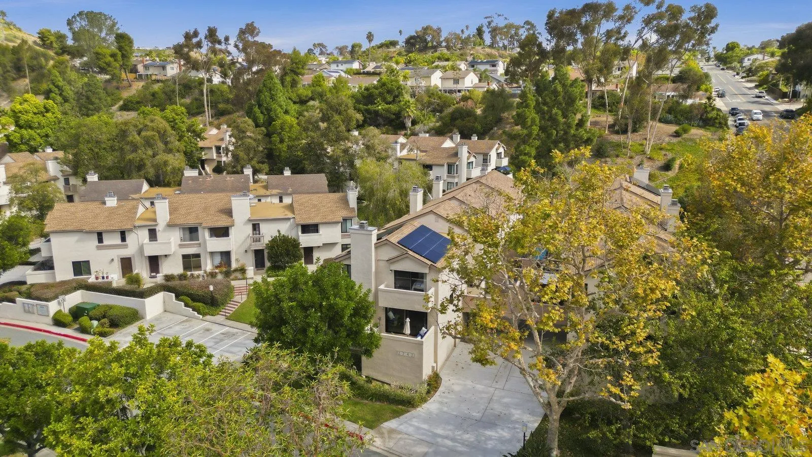 2742 Ariane Drive, Unit 153 San Diego, CA 92117 - Photo 3 of 43 aerial view of residential houses with outdoor space