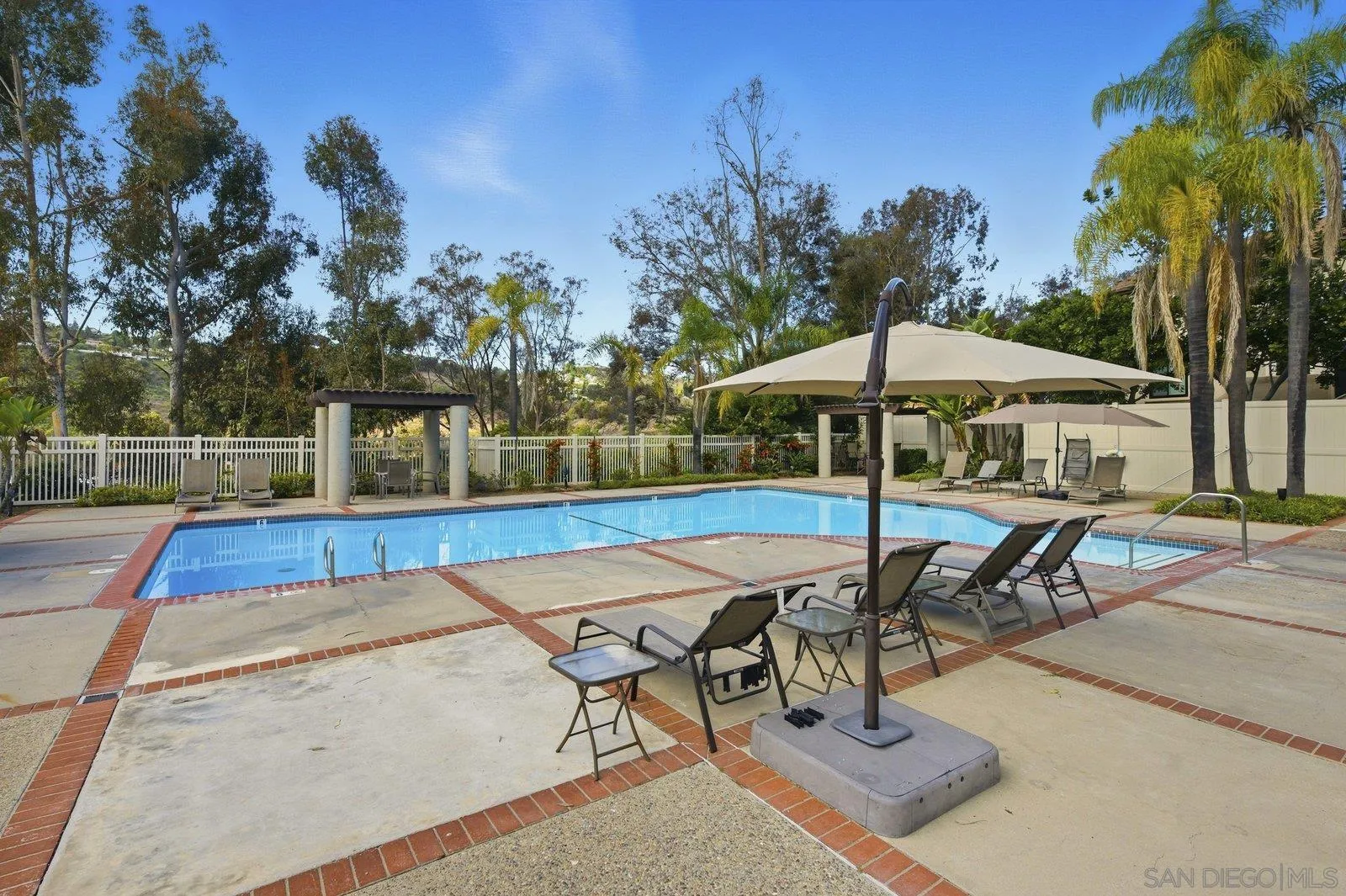 2742 Ariane Drive, Unit 153 San Diego, CA 92117 - Photo 32 of 43 a view of a backyard with sitting area