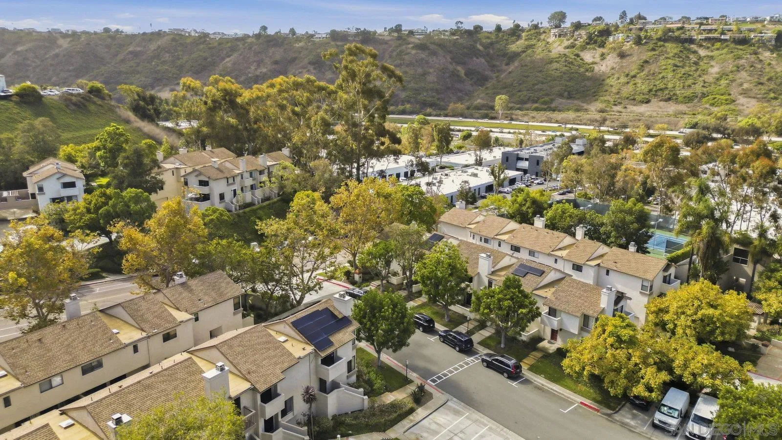 2742 Ariane Drive, Unit 153 San Diego, CA 92117 - Photo 36 of 43 an aerial view of residential house with green space