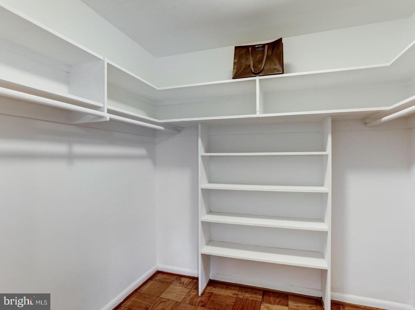 2400 41st Street Northwest, Unit 203 Washington, DC 20007 - Photo 19 of 24 a view of a room with shelf on the wall